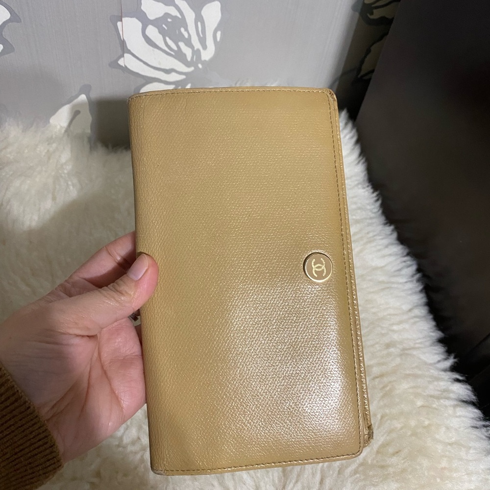 Beige Chanel long wallet with card slots and lots of pockets